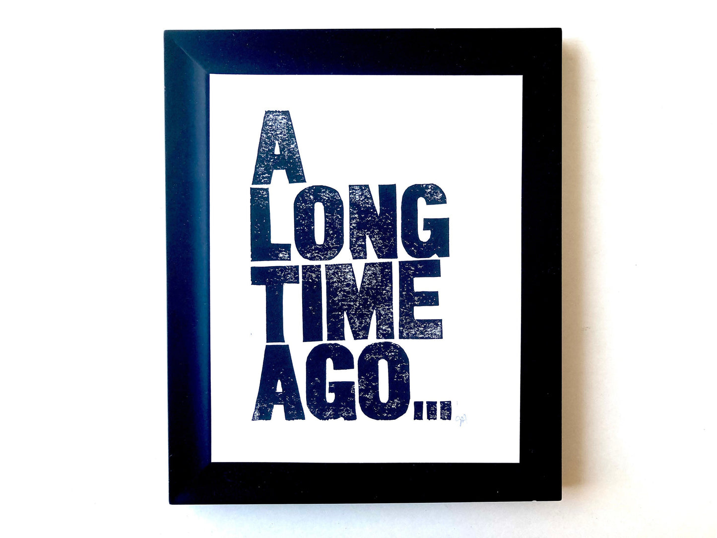 Framed print with 'A Long Time Ago' text on a white background