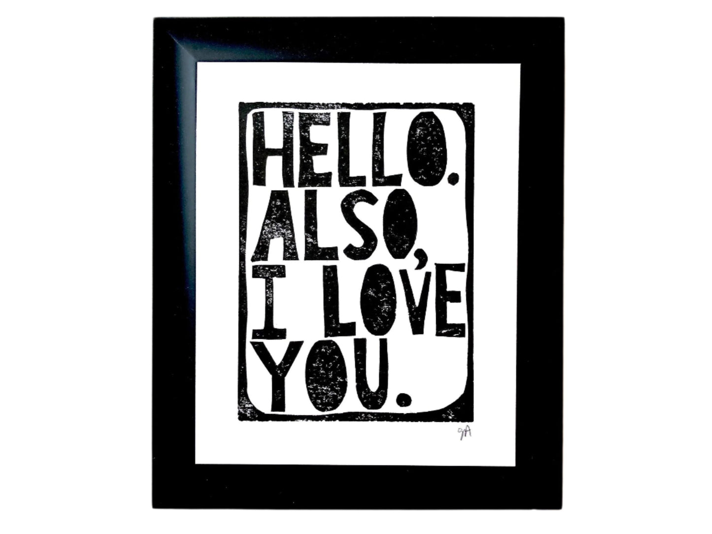 Framed linocut print with 'Hello. Also, I love you.' text on a white background