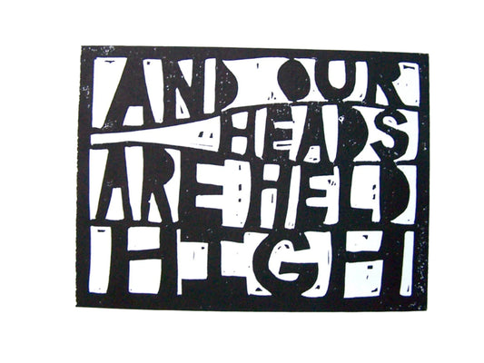 Black and white inspirational typography linoleum block print with text "and our heads are held high"