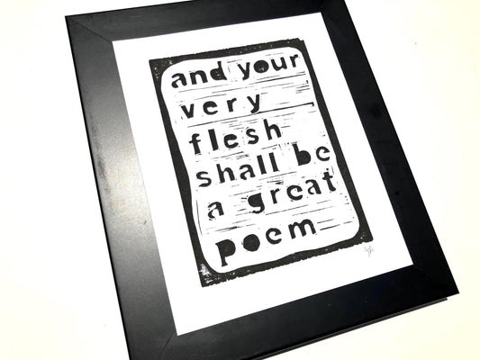 Framed print with text 'and your very flesh shall be a great poem' on a white background