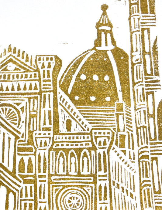 Gold-colored illustration of a cathedral with a dome on a white background