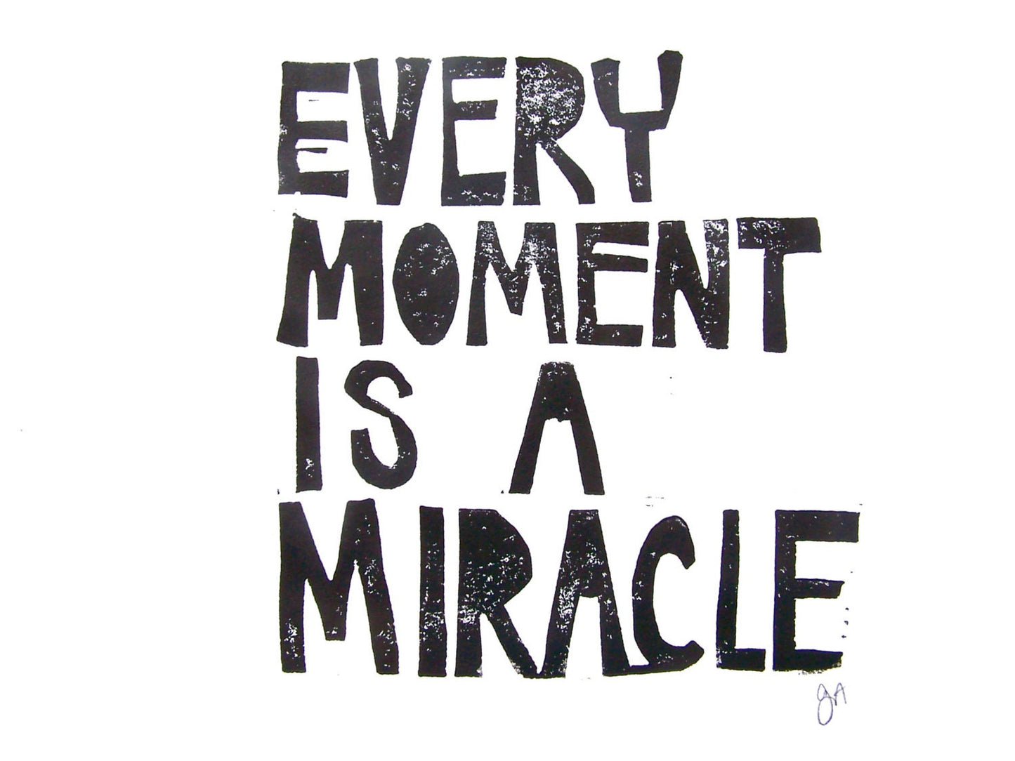 Black text on a white background with motivational quote 'Every moment is a miracle'.