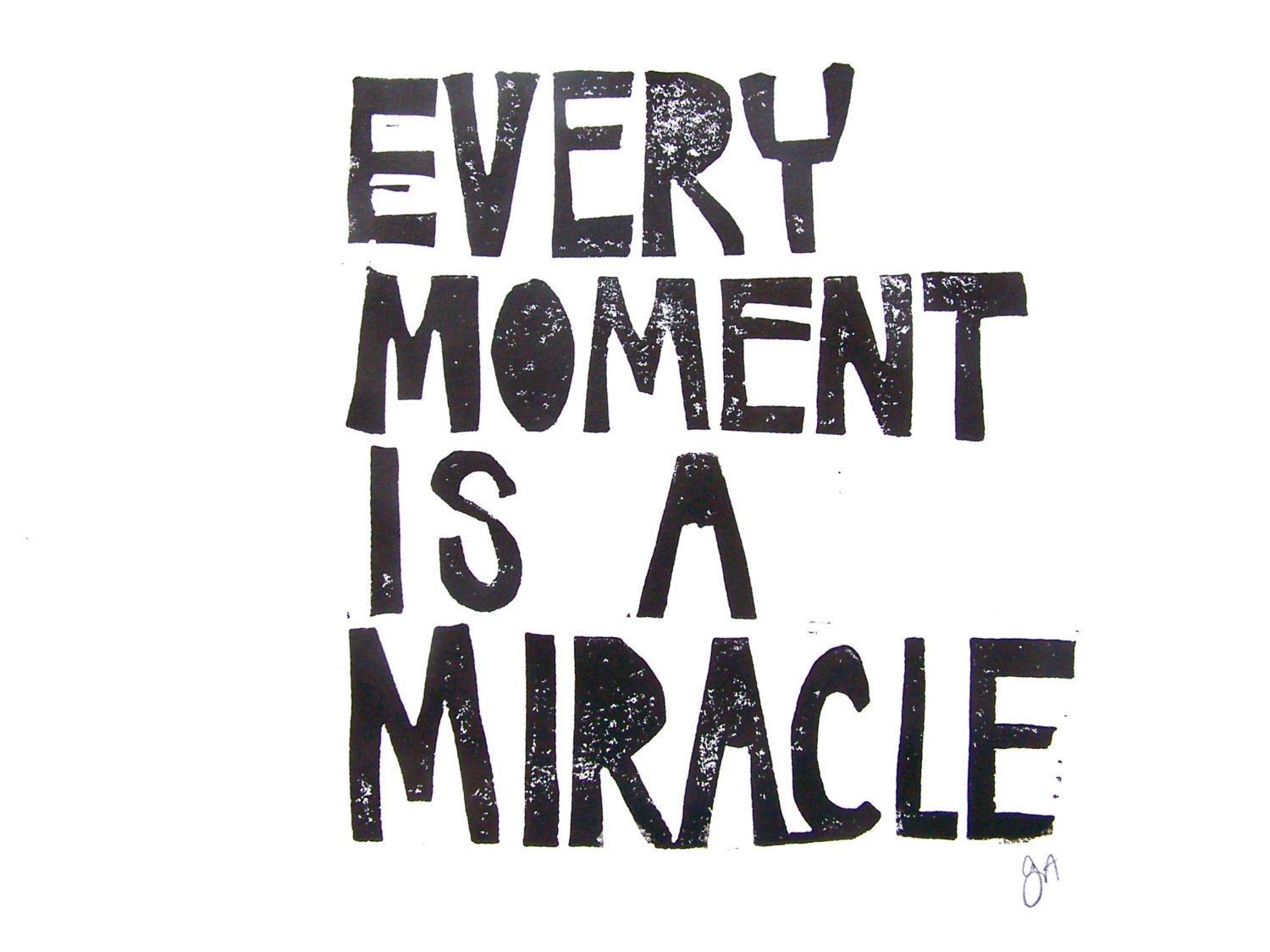 Black text on a white background with motivational quote 'Every moment is a miracle'.