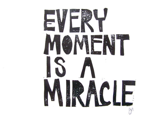Black text on a white background with motivational quote 'Every moment is a miracle'.