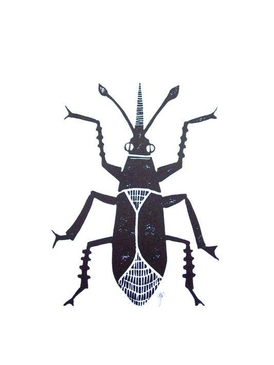Black silhouette of a beetle on a white background