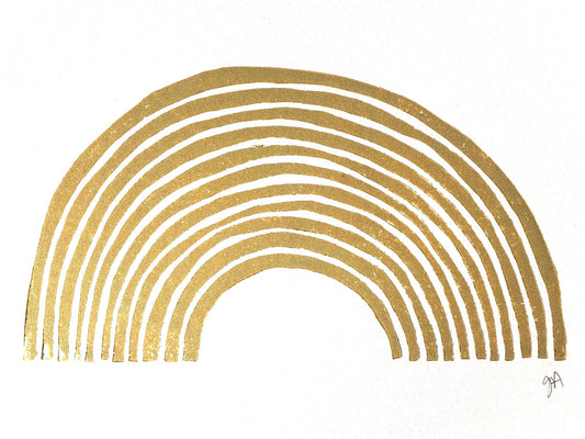 Gold rainbow design on a white background