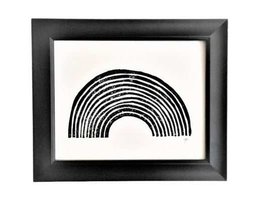 Framed black and white linocut print