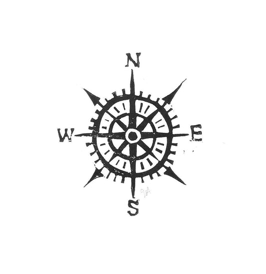 Black compass rose on a white background