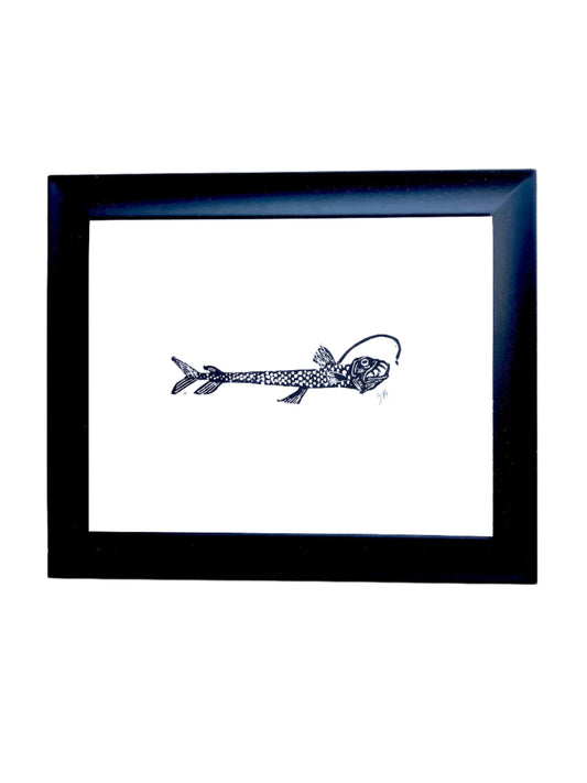 Framed artwork of a stylized viperfish on a white background