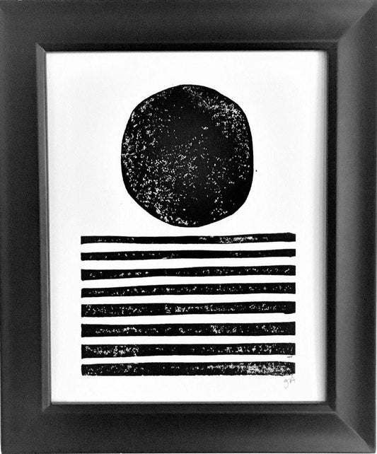 Framed black and white abstract art print on a white background
