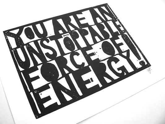 Black and white linocut print on a white background with a motivational quote